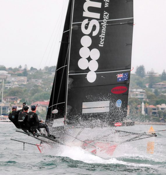 Smeg leads the fleet around the Beashel Buoy on her way to victory in Race 4 of the NSW 18ft Skiff Championship